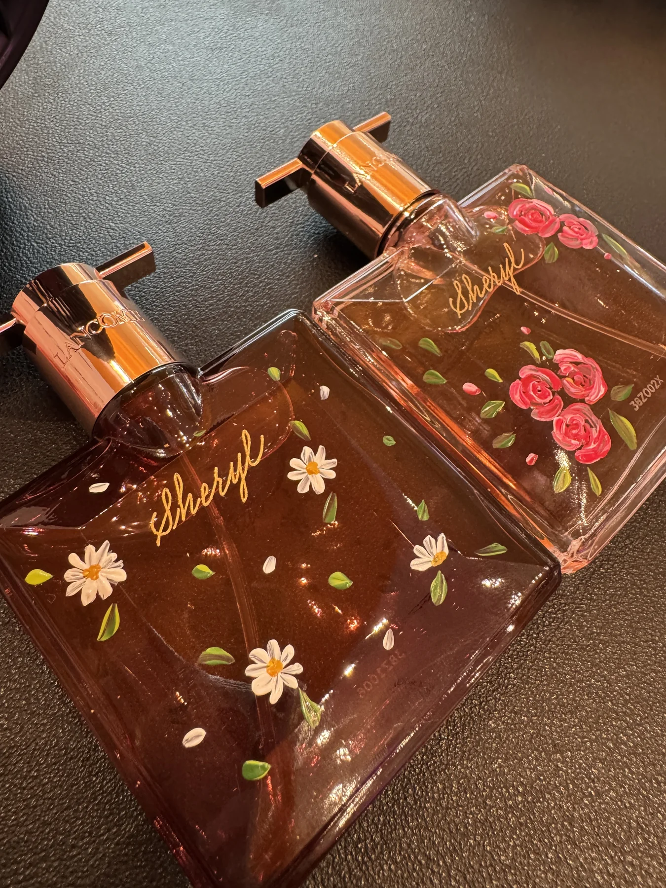 Pair of hand-painted bottles