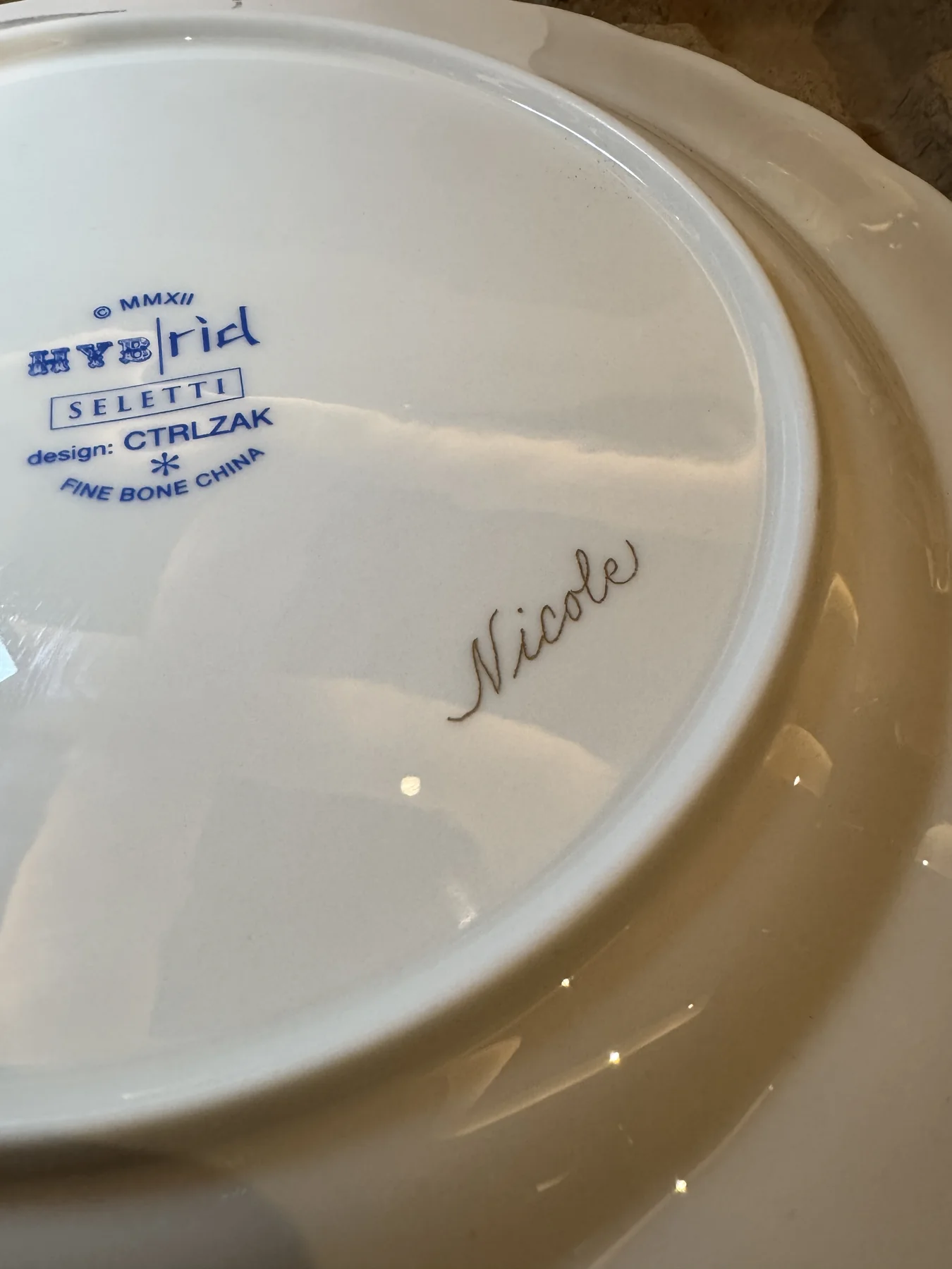 Name engraved on porcelain