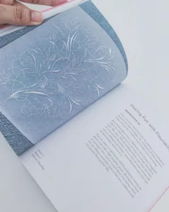 Detailed flourished calligraphy featured in print