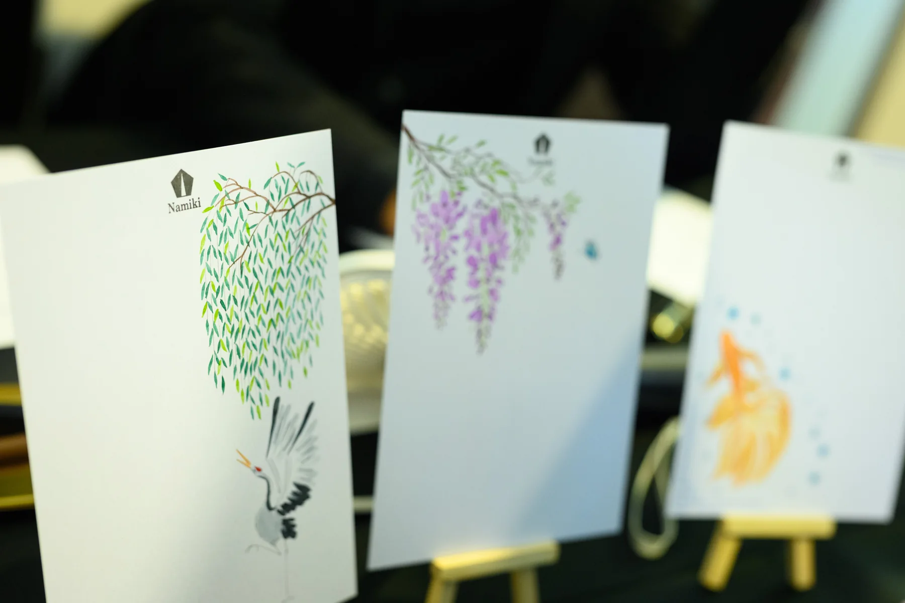 Watercolour illustrations displayed at an event